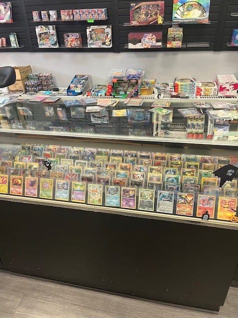 Elite 4 TCG & Sports